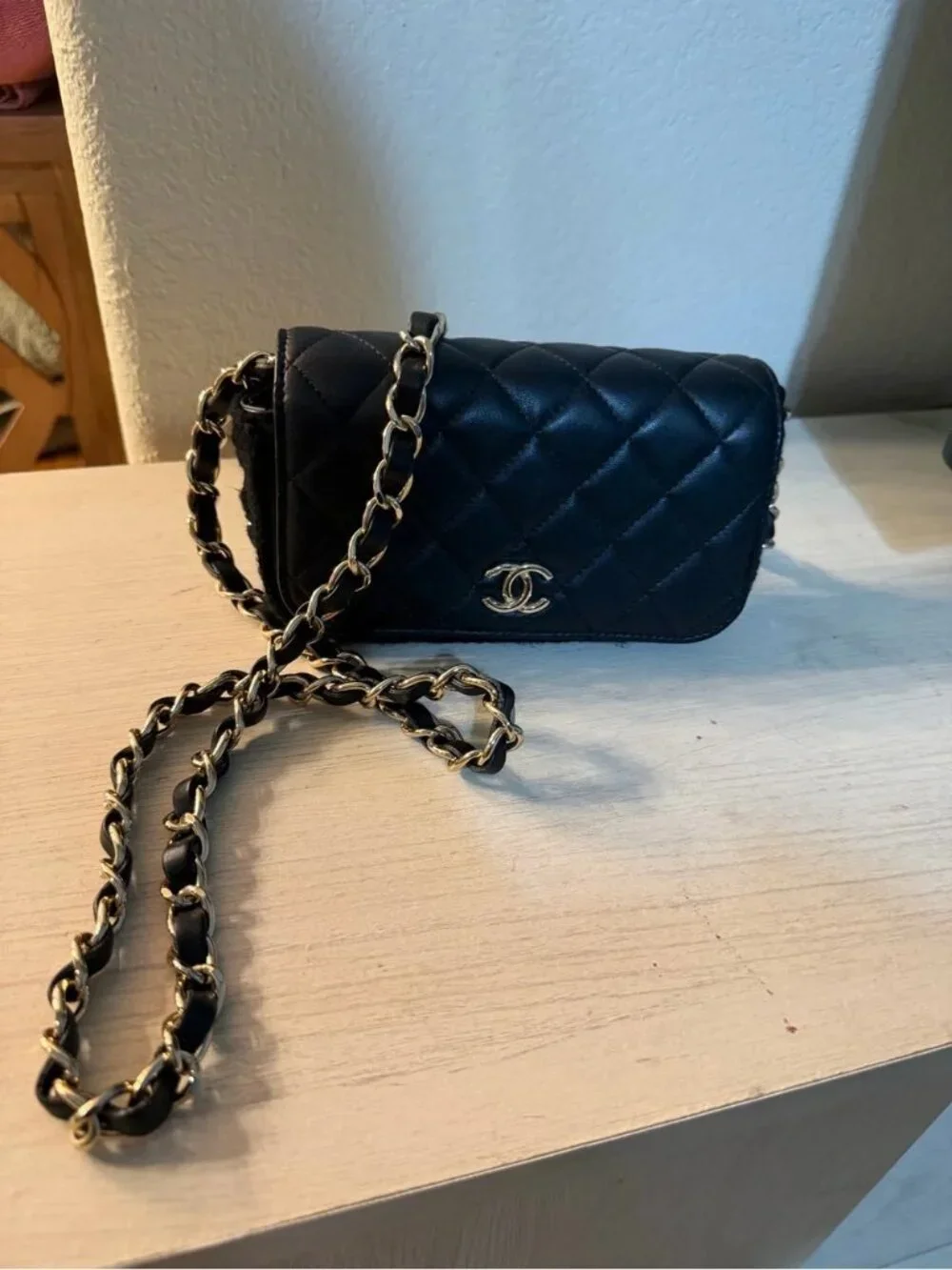 CHANEL Black Quilted Crossbody with Gold Chain Strap